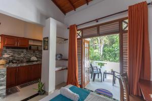 Η κουζίνα ή μικρή κουζίνα στο Frogan villa