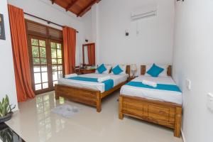 Ένα ή περισσότερα κρεβάτια σε δωμάτιο στο Frogan villa +55 φωτογραφίες