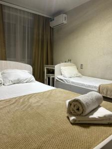 Postel nebo postele na pokoji v ubytování Silk Way
