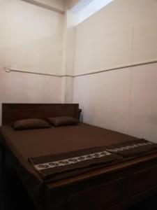 Postel nebo postele na pokoji v ubytování Sesatha Guest