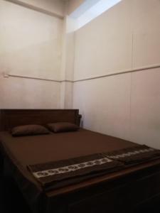 Postel nebo postele na pokoji v ubytování Sesatha Guest