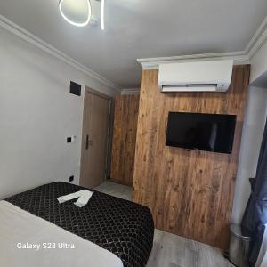 TV a/nebo společenská místnost v ubytování old hatay hotel