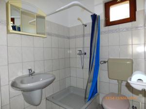 Koupelna v ubytování Fábián Apartman-ház