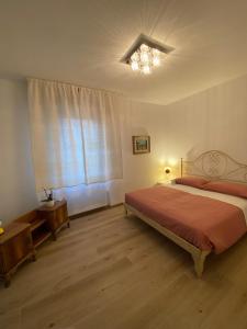 Postel nebo postele na pokoji v ubytování b&b Tati
