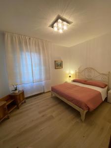 Postel nebo postele na pokoji v ubytování b&b Tati