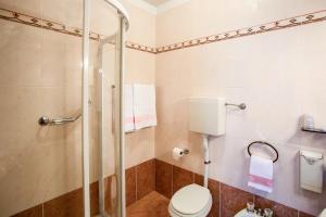 Vannas istaba naktsmītnē Hotel Romagna