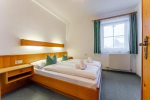 Postel nebo postele na pokoji v ubytování Apartment Sonnberg
