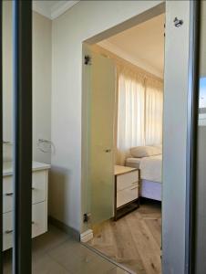 Ένα ή περισσότερα κρεβάτια σε δωμάτιο στο Walmer Hideaway