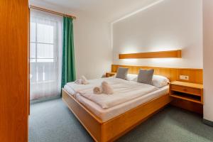 Postel nebo postele na pokoji v ubytování Apartment Sonnberg