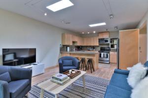 a living room with a couch and a table at Palo Alto 2br w laundry nr shopping center SFO-1651 in San Francisco +9 photos