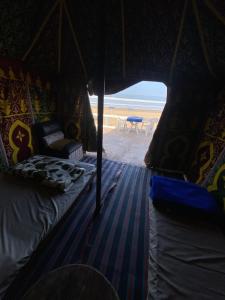 Postel nebo postele na pokoji v ubytování Nomadic Beachcamp