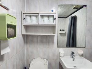 a bathroom with a toilet and a sink and a mirror at UngsungKo Land # Family trip # Soongsil University # Chung-Ang University # Sangdo Station # OTT in Seoul