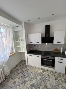 Kuchyň nebo kuchyňský kout v ubytování Apartmán Desná Jizerské hory