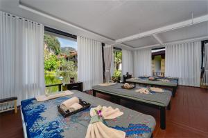 Un pat sau paturi într-o cameră la Railay Princess Resort & Spa +108 fotografii