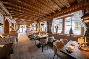 Reštaurácia alebo iné gastronomické zariadenie v ubytovaní Boutique Hotel Montanara