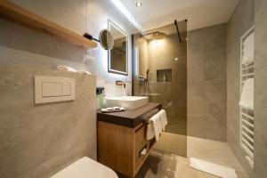 Kúpeľňa v ubytovaní Boutique Hotel Montanara