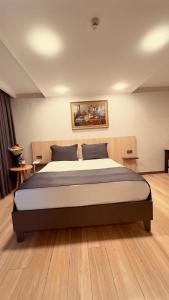 a bedroom with a large bed in a room at The Green Park Taksim in Istanbul