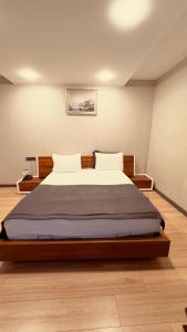 a bedroom with a large bed in a room at The Green Park Taksim in Istanbul
