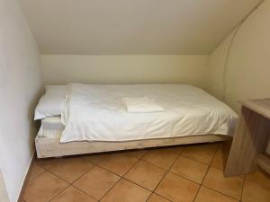 Postel nebo postele na pokoji v ubytování HS Hotel