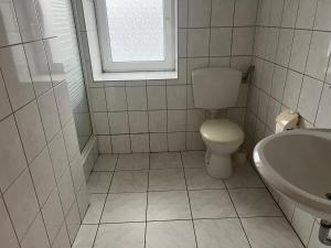 Koupelna v ubytování HS Hotel