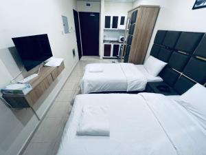 Postel nebo postele na pokoji v ubytování Landtech Vacation Homes - Baniyas Square