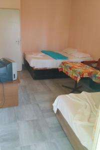 En eller flere senge i et værelse på Бунгала Дъбрава