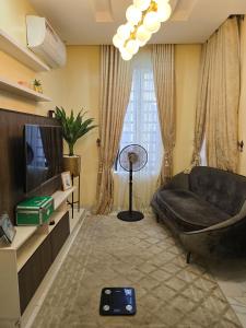 Televisyen dan/atau pusat hiburan di 4 bed duplex in prime location