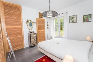 Postel nebo postele na pokoji v ubytování Appartement City Garden - Welkeys + 16 fotografií