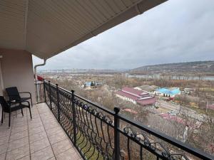 a balcony with a view of a town at Hotel Anastasia in Rezina