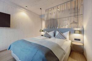Katil atau katil-katil dalam bilik di Mariengut - Natur Aparthotel Kramer