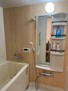Kopalnica v nastanitvi Ns Home 南名古屋一軒家ルームシェア-3G + 30 fotografij