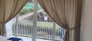 Balkon oz. terasa v nastanitvi Misty Cabin Valley View