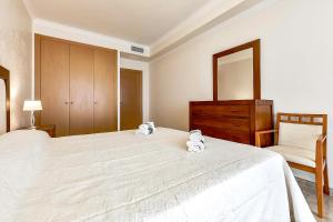 Posteľ alebo postele v izbe v ubytovaní Apartment with spectacular view in Puerto Santiago