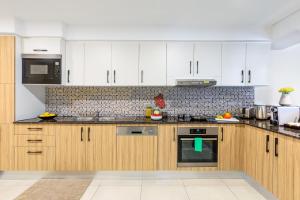 Dapur atau dapur kecil di Somerset West Bay Doha