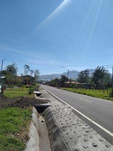 a road with a drain in the middle of the road at Casa Rosita in Chiriquí +9 photos