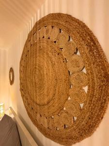 a wreath hanging on a wall in a room at Boho City Livings Munich Central Station in Munich