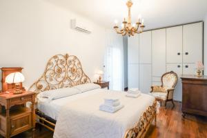 Postel nebo postele na pokoji v ubytování La Villa di Rudy