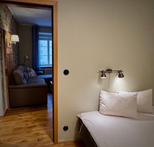 Voodi või voodid majutusasutuse Kohtu Apartment Epoch toas
