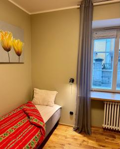 Voodi või voodid majutusasutuse Kohtu Apartment Epoch toas