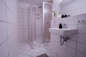 Koupelna v ubytování PrimeLoft Stadtblick - stilvoll & modern - Zentrum Braunlage - bis 5 Pers - mit Parkplatz