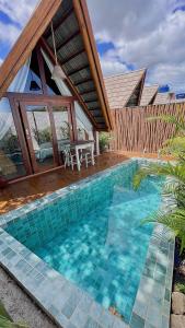 Pousada Villa di Luna内部或周边的泳池