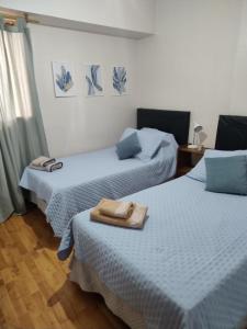 Postel nebo postele na pokoji v ubytování Céntrico, amplio y luminoso