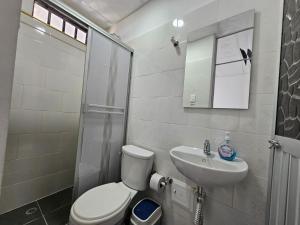 Koupelna v ubytování Hotel YUMA TATACOA