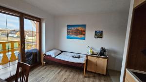 Postel nebo postele na pokoji v ubytování Apartmán Beáta - tatragolf, 2 izb