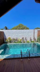 Pousada Villa di Luna内部或周边的泳池
