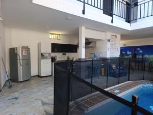 Kuchyň nebo kuchyňský kout v ubytování Hotel YUMA TATACOA