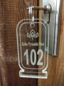 Certifikat, nagrada, znak ali drug dokument, ki je prikazan v nastanitvi Pyramids View RZ 1