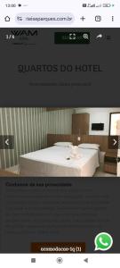 a website for a hotel with a bed in a room at Encontro das águas in Caldas Novas