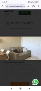 a website for a hotel with a couch in a room at Encontro das águas in Caldas Novas