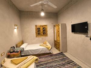 A bed or beds in a room at انير انشال Enir Enshal